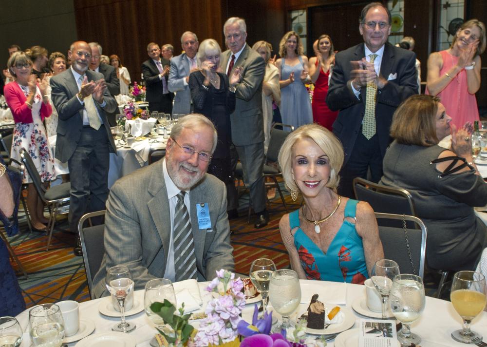 Rich and Joyce Johnson receive a standing ovation at VCU Health’s 2019 Shining Knight Gala after their $1 million gift to the surgical trauma intensive care unit was announced. Photo: Kevin Morley, VCU University Relations