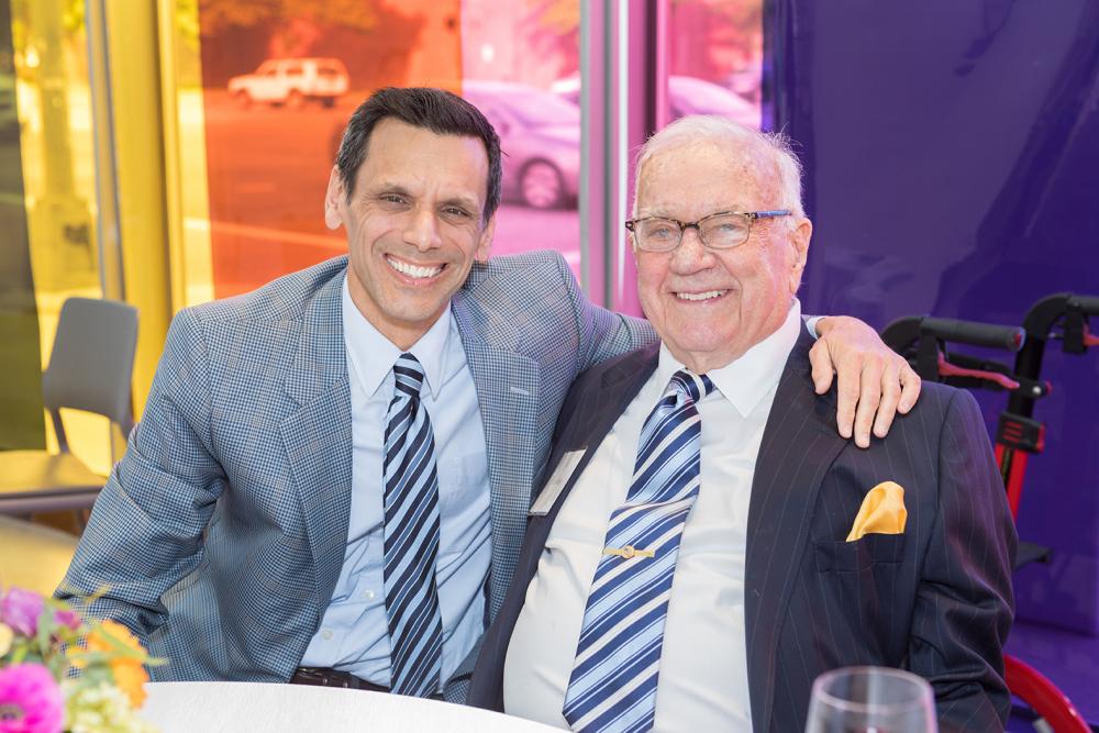 Michael Rao, Ph.D. (left), VCU president, sits with Ken Wright, one of VCU Health’s most generous supporters, at the 2019 MCV Society reception.