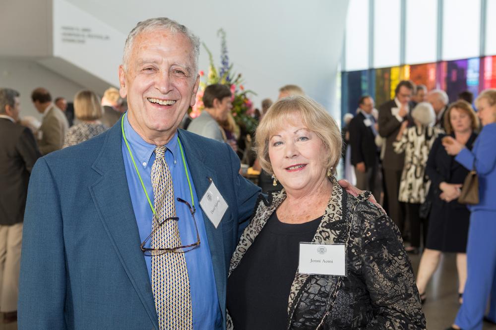 David F. Saleeba, Jr., a 1962 School of Pharmacy graduate, pauses with fellow MCV Society member Jenni Aerni at the 2019 MCV Society reception.