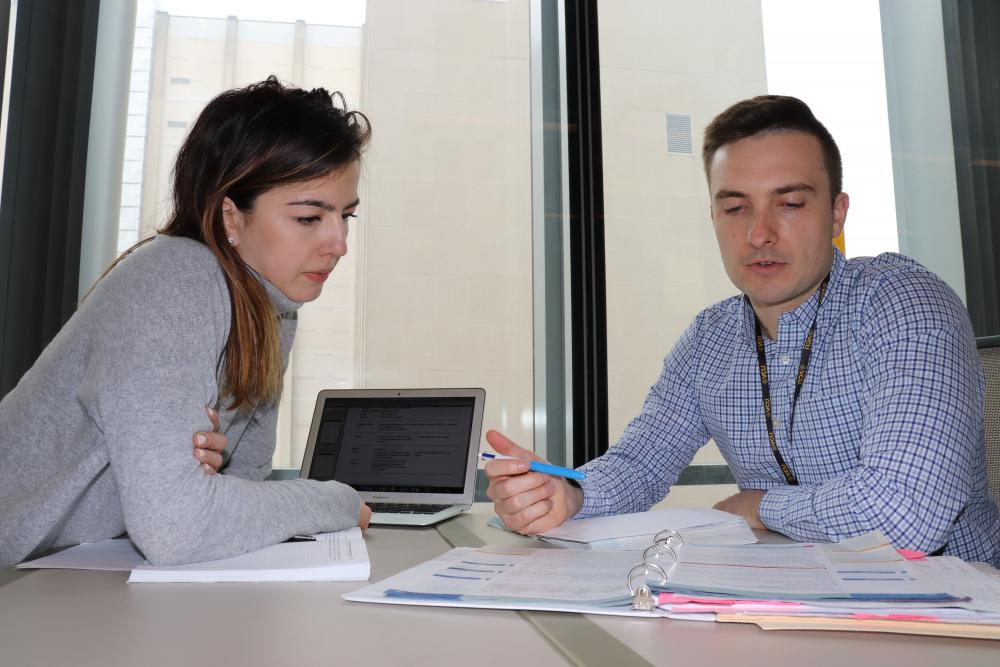 David Killeen and fellow medical student Michelle Baer review class notes this spring in the VCU School of Medicine’s McGlothlin Medical Education Center. David is an fmSTAT student who said he serves as a resource for students throughout the school who are interested in family medicine.