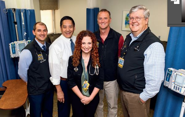 Leadership of the VCU Massey Cancer Center CAR T-cell therapy team includes (left to right) Gary Simmons, D.O.; Harold Chung, M.D.; Christina Wiedl, D.O.; William Clark, M.D.; and John McCarty, M.D. (not pictured, Amir Toor, M.D., and Judy Davis, R.N.). Photo: Kevin Schindler