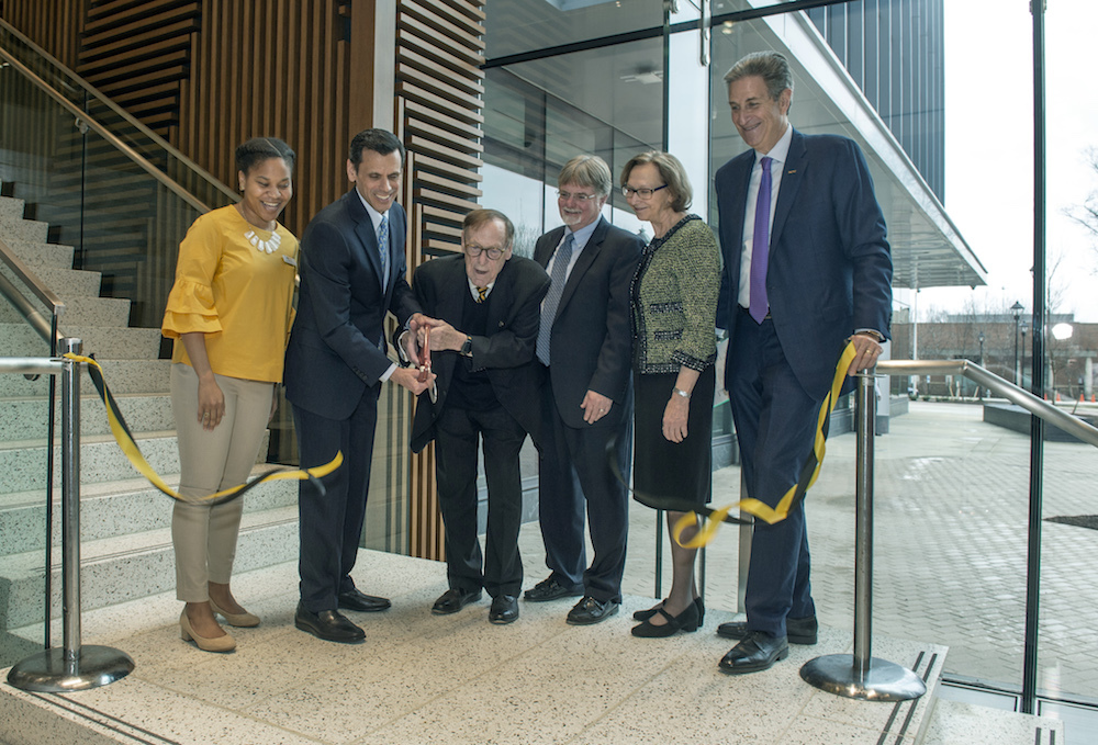 (L to R) Kaelah Pau, an occupational therapy doctoral student at the College of Health Professions; Michael Rao, Ph.D., president of VCU and VCU Health System; Cecil B. Drain, Ph.D., former dean of the college; Lex Tartaglia, D.Min., acting dean of the college; Marsha Rappley, M.D., senior vice president for health sciences at VCU and CEO of VCU Health System; and Harry Thalhimer, MCV Foundation board chair, cut the ribbon to the college’s new building. Photo: VCU University Marketing