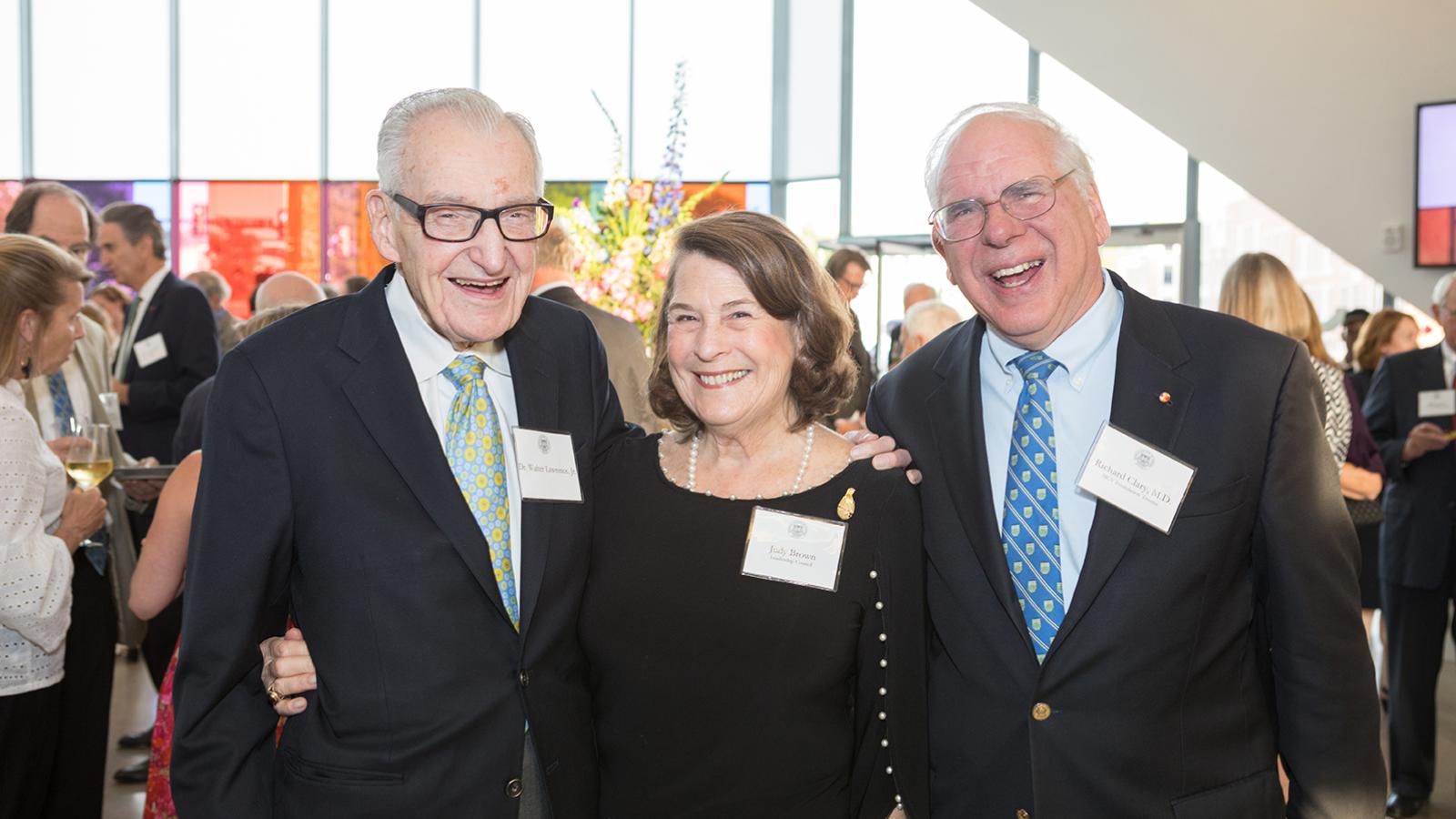 Walter Lawrence Jr., M.D. (left), founding director of VCU Massey Cancer Center; Judy Brown, MCV Foundation Leadership Council member; and Richard Clary, M.D., MCV Foundation board member, converse at the 2019 MCV Society reception. Photos: CSI Studio LLC