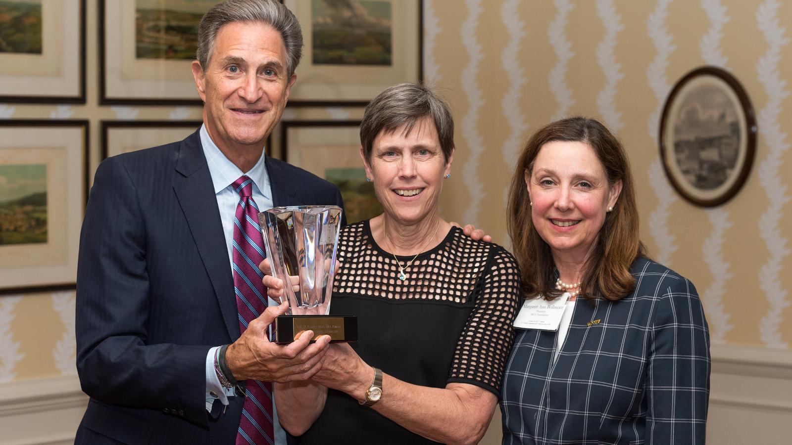 Jean Giddens, Ph.D., RN, FAAN (center), dean of the VCU School of Nursing, received the Robert Irby Award for her outstanding work with major fundraising efforts on the MCV Campus. She is thanked by Harry Thalhimer, MCV Foundation board chair, and Margaret Ann Bollmeier, MCV Foundation president. Photos: Kevin Schindler 