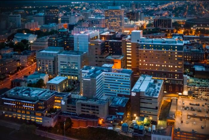 VCU Health campus at night.